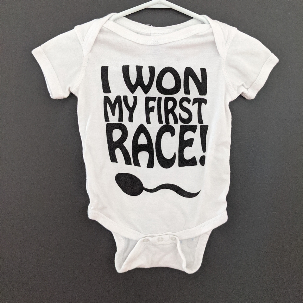 "I won my first race" white onesie/bodysuit